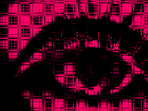 Close up of a human eye and eyelashes stylised with a digitised appearance in duotone colours of red and black