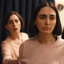 Still from the film The Seed of the Sacred Fig showing three woman standing together