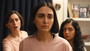 Still from the film The Seed of the Sacred Fig showing three woman standing together