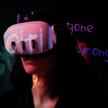A white woman wears a VR headset, there are words laid over the top of her, excited, gone, and wrong.