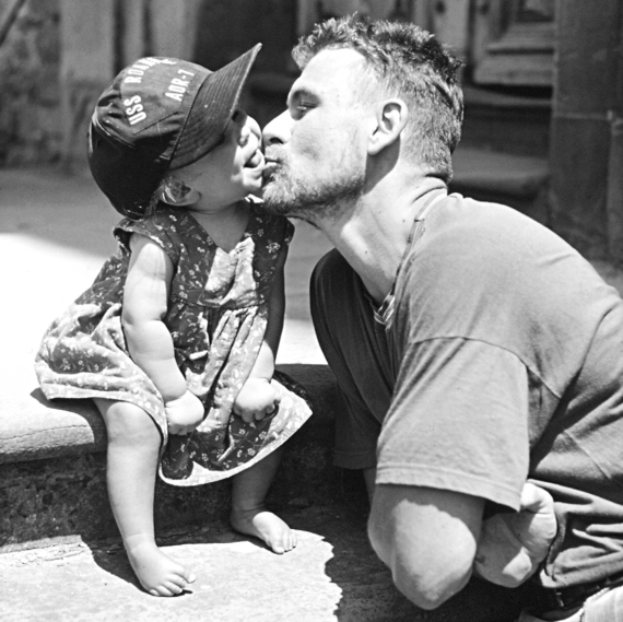 Andrew Kötting and his daughter Eden in the 1990s.
