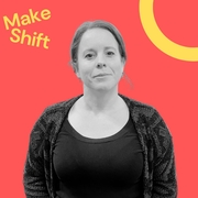 Bella is a white woman in a black outfit with a confident expression against a red background with "Make Shift" text and a partial yellow circle design.