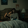 Obsession - a couple in bed