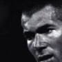 Grayscale close-up of a man's face.
