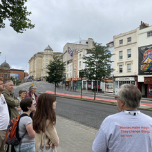 A photo of Mark Fuller leading a Cinema Walk at Cinema Rediscovered 2022.