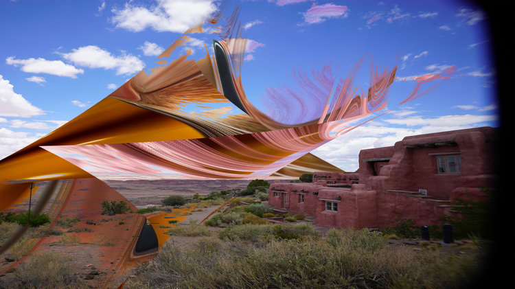 Surreal landscape with abstract, swirling shapes in the sky over a desert scene. Red adobe building and vegetation add contrast under a bright blue sky.