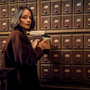 A Private Life - a woman checking files