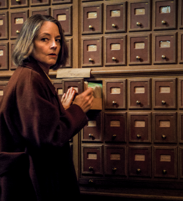 A Private Life - a woman checking files