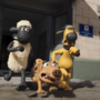 Claymation characters Shaun the Sheep, Bitzer the dog, and Toby the terrier stepping out of the "Animal Containment Unit" building.