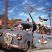 Wallace drives a blue Anti-Pesto SWAT Team car, with Gromit learning out of the front door holding a net.