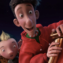 Animated scene of two characters, one human and one elf-like, excitedly looking over the edge of a red sleigh at night.