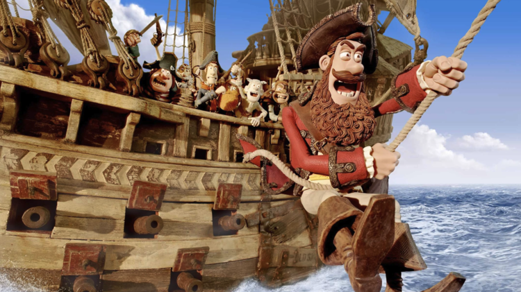 Animated pirate crew aboard a wooden ship, with a bearded pirate swinging on a rope over ocean waves under a blue sky with clouds.