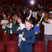 A photo of Ali Plumb hosting his film quiz in a cinema