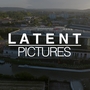 An image of a cityscape, with the LATENT PICTURES text overlaid on it. 