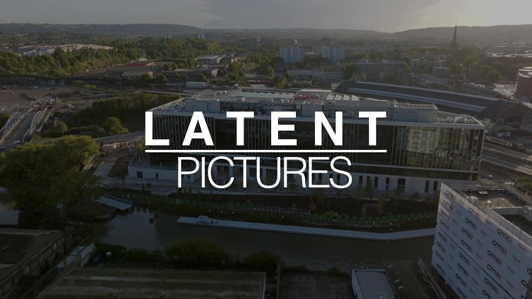 An image of a cityscape, with the LATENT PICTURES text overlaid on it. 