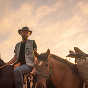 A man on a horse.