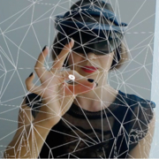 A picture of Jane Gauntlett, taken through a headset.