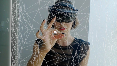 A picture of Jane Gauntlett, taken through a headset.