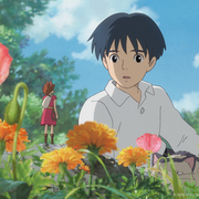 Anime scene of a boy and tiny girl surrounded by colourful flowers under a bright blue sky.