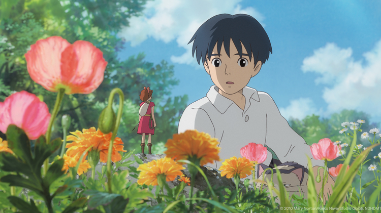 Anime scene of a boy and tiny girl surrounded by colourful flowers under a bright blue sky.