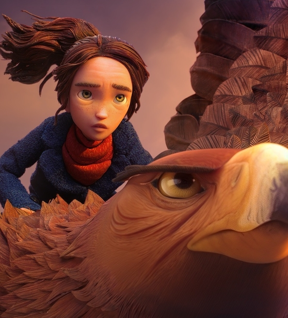 Animated young rider with tousled hair sits behind a large feathered bird, silhouetted by a warm sunset sky.
